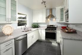 grey tile floor and white cabinets