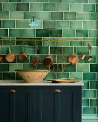 Atelier sagitta has added a dose of colour to this previously characterless apartment in the paris suburbs by creating an almost entirely green with this in mind, the architects decided to paint the kitchen cabinetry, ceiling, and peripheral walls a bold shade of emerald green, mimicking the colour. Emerald Green London Tiles Devol Kitchens