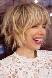 Hairstylists all over the world constantly revamp hairstyles with fringe bangs to give them new twists. Blonde Balayage On A Shaggy Bob Shorthaircuts Sh Hairs London