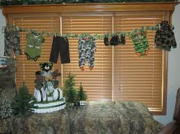 Clothes Line Display Of Camo Baby Clothes Baby Shower Camo Baby Shower Clothes Hunting Baby Showers