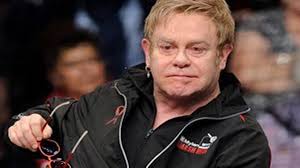 I'm not still standing, yeah yeah yeah' Sir Elton John pokes fun at himself  after falling off chair