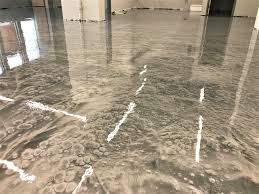 You can use a floor grinder that can polish concrete. What Is A Decoessence Metallic Epoxy Floor Coating