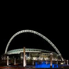 Although the roof does not fully close, all seats can technically be 'covered.' Wembley Stadium By Foster Partners