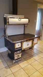 Cuisiniere A Bois Heartland Oval Avec Boiler Autre Ouest De L Ile Kijiji Antique Wood Stove Antique Kitchen Stoves Retro Kitchen
