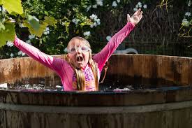 A hot tub, however, allows you to soak the problems away, or if not, at least give you the chance to relax. Little Girl Playing In Hot Tub By Rowena Naylor Stocksy United