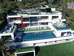 The Ultra Modern Bel Air California Home Is The Creation Of Bruce Makowsky A Real Estate Developer Who The New York Mansions Expensive Houses Modern Mansion