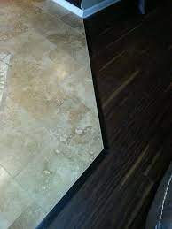 Perfect for your next project. Travertine And Luxury Vinyl Plank Transition Floor Tile Design Vinyl Flooring Flooring