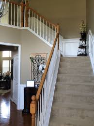 Ask a helper to hold a length of chair rail against the wall if there is not an obvious top or bottom to the rail. Chair Rail Shadow Boxes Going Upstairs And In Foyer Love It Home Shadow Boxes Foyer
