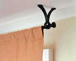 Hang A Curtain Rod From The Ceiling Instead Of The Wall When You Have Narrow Space To Work With This Is From Pot Ceiling Mounted Curtains Curtains Home Decor