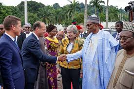 Image result for British Prime Minister, Theresa May arrives Nigeria, heads to Aso Villa