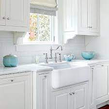 White, delicate cream and sand colors fit for modern kitchen design. Gray Kitchen With Turquoise Accents Design Ideas