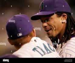 Arizona Diamondbacks' Chad Tracy, right, is congratulated by teammate Troy  Glaus, left, after hitting a solo home run in the first inning against the  Chicago Cubs Thursday, July 28, 2005 in Chicago.