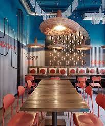 Formafatal Designs Burrito Loco Restaurant As Modern Mexican Fiesta Mexican Restaurant Decor Mexican Restaurant Design Mexican Restaurants Interior