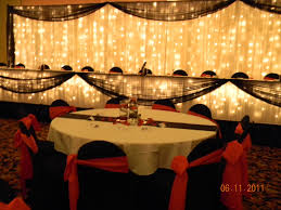 Head Table White Drapery Lights Backdrop Black Draping Black Chair Covers Red Head Table Wedding Backdrop Head Table Wedding Head Table Wedding Decorations