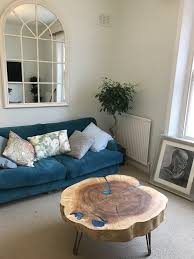 If you're not a fan of raw dowels and plywood edges, then a simple edge cutter or iron will give the whole piece a more finished less. Live Edge Coffee Tables That Capture Nature S Beauty In Their Designs
