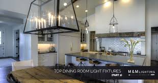 The black dining table and gray chairs offer a minimalist look and allow the lighting fixture to stand out. Interior Lights Houston Top Dining Room Light Fixtures Part 2