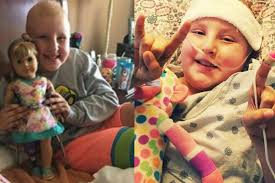 Young amputee given the gift of beautiful doll with matching...
