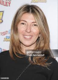 Alex Emelin, Mickey and Irina Emelin attend the Ringling Bros. and... News  Photo