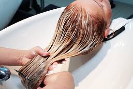 Leave the conditioner on for half an hour. 5 Ways To Use Coconut Oil For Silky Hair