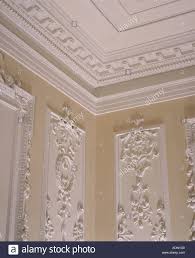 Close Up Of Plasterwork Cornice And Ceiling Above Walls With Ornate Plasterwork Panels Stock Photo Classic Ceiling Ornate Wall Trim