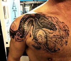 9 Stylish Stunning Cobra Tattoo Designs In 2021 Cobra Tattoo Snake Shoulder Tattoo Cobra Tattoo Design