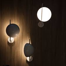 It's available a second stylish version of superluna in black, with the inner curve of the shades in white. Superluna Wall Lamp Oluce