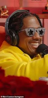 Nick Cannon surprises one of his six baby mamas Abby De La Rosa with 3000  red roses during their radio show... months after welcoming 12th child