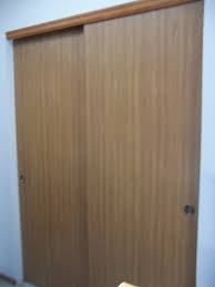 Sliding closet doors are convenient in most cases. Remodelaholic Frugalicious Closet Door Makeover Monthly Contributor