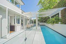 The setup of my yard space is sort if awkward. Lap Pool On Side Boundary Beach House Style Pool Lap Pool