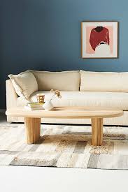 The table is crafted from tropical hardwood and supported by a hammered antique brass base, and the tabletop is covered with a handcrafted bone inlay. Anthropologie Kalle Sculptural Oak Coffee Table By In Beige Size S Modesens
