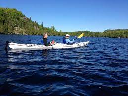 A Couple Guests Having Fun On One Of Our Daily Guided Kayaking Tours During The Summer Bluefin Bay Kayak Tours Kayaking