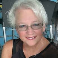 Jen Merchant Fishing with Jen with a 7'4” or greater hammerhead shark  tagged and released