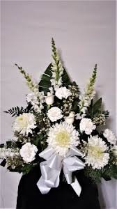 However, any arrangement of flowers may be appropriate at a funeral. Snow White Funeral Arrangement In Kenton Oh Blossom Gallery Florist