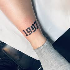 Birth Year Tattoo Designs On Leg Tattoo Born In 1997 Tattoo Born In 1997 Born Mountaintattoo Tattoo Tattoogirlbody Tattoogirlcute Tattooleg In 2020 Tattoos Small Tattoos Writing Tattoos