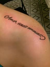 Amor Vincit Omnia Which Translates Into Love Conquers All Tattoo Lettering Tattoo Quote Word Tattoos Tattoo Lettering Meaningful Wrist Tattoos