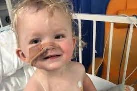 Langford aunt of toddler who died of a brain tumour visits research centre  focused