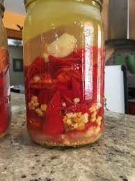 This intensifies the flavor of fermenting peppers is an essential step in making hot sauce. First Attempt At Hot Sauce Thought Is The White Cloudy Stuff Near The Bottom Ok At 6 Days Fermentation