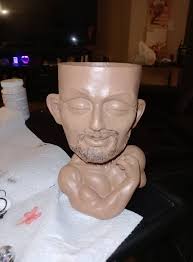 Buckethead painting ideas with black paint and brush