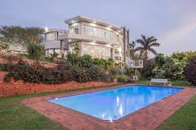 Art Deco Mansion In Durban North South Africa Beautifully Maintained Art Deco Mansion Perched Atop A Hi Luxury Swimming Pools Art Deco Home Durban North