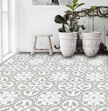 A new vinyl tile floor is an inexpensive way to upgrade any room's appearance. Patterned Peel Stick Floor Tiles Design Sponge