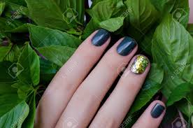 Other nail design green nail designs require you to have clean nails. Basil In Female Hand With Beautiful Dark Green Nail Design Stock Photo Picture And Royalty Free Image Image 47469461