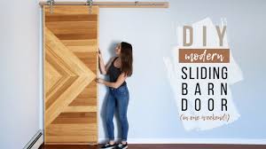 This sliding barn door tutorial is detailed with step by step instructions to build your own custom barn door. Diy Sliding Barn Door With Window Youtube