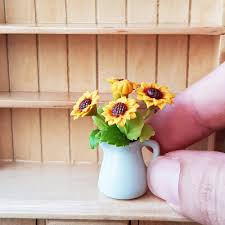 I'd say making the teacup fairy garden. 2x Mini Sunflowers Clay Flowers In Ceramic Vase Pitcher Dollhouse Miniature Fairy Garden Decoration Thaiminiaturestore