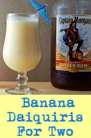 This Banana Daiquiri Recipe Combines Fresh Banana Coconut Milk Lime Juice Sugar Captain Morgan Spiced Spiced Rum Drinks Rum Drinks Recipes Daiquiri Recipe
