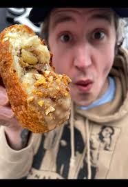 Indulge in Poutine Nachos at Shakers Public House