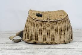 A collection of fishing creels to drool over. Antique Woven Wicker Creel Fishing Basket Canvas Strap Wood Dowel Latch Wicker Wood Dowel Fishing Basket
