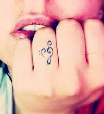 See More Music Note Tattoos On Finger Tattoos Ring Finger Tattoos Music Tattoos
