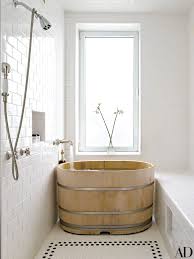 Bette Midler S Light Filled Manhattan Penthouse And Lush Garden In 2020 Soaking Tub Shower Combo Small Soaking Tub Bathroom Design Small Modern