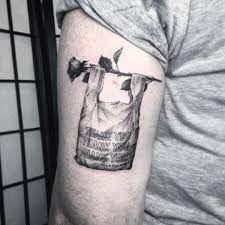 Delicate Flowers Juxtaposed With Modern Dystopian Imagery In Tattoos By Lena Lu Optical Illusion Tattoo Inner Elbow Tattoos Optical Illusions