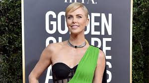 She was raised on a farm outside the city. Charlize Theron Slays 2020 Golden Globes Red Carpet In Sexy One Shoulder Gown Pics Entertainment Tonight